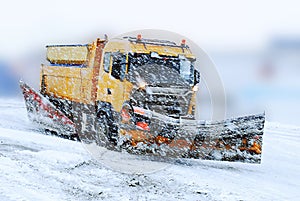 Snow plough in bad weather