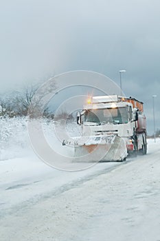 Snow plough clearing heavy snowfall