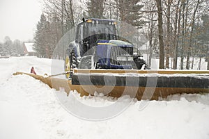 Snow plow cleaning street