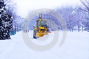 Snow plow clears the road.