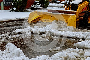 Snow plow truck clearing road after winter snowstorm blizzard vehicle access