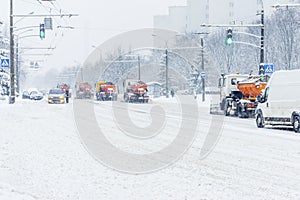 Snow plow truck at work