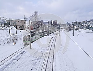 Snow railtrack and train in Otoru city Hokkaido Japan mid Winter