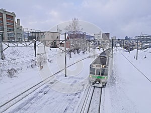 Snow railtrack and train in Otoru city Hokkaido Japan mid Winter photo