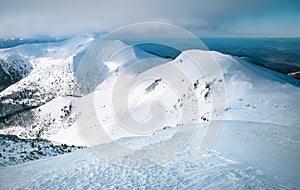 Snow range of Mala Fatra in Western Carpathians mountains landscape image. Velky Krivan - the top mountain point of view