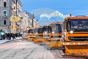 Snow removal equipment clears the Avenue after a snowfall