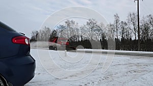 Snow-removing machine removes snow from the road. Slow motion