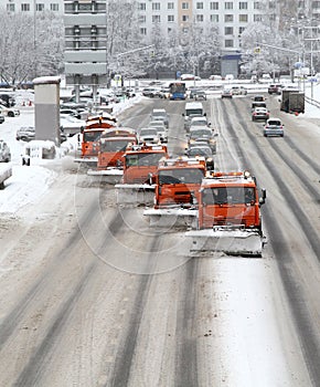 Snow-removing machines on the city roads