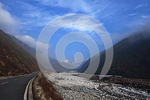 Snow river near the road