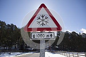 Snow road sign on a local mountain road