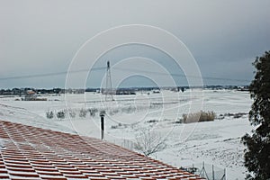 Snow on the roof of a farm