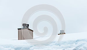 Snow on the roof  of restuarant  in ski resort photo