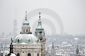 Snow on the roof of St. Nicholas church, Prague