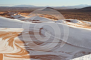 Snow in desert sahara photo