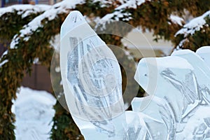 Snow sculpture, frozen in a dynamic and action-packed pose.