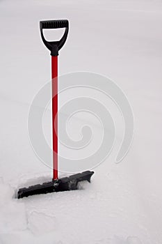 Snow Shovel Stuck in Deep Snow
