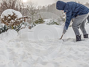 Snow shoveling after heavy snowfall