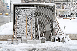 Snow shovels in the winter outside