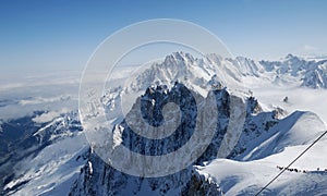 Snow slope with mountain-skiers