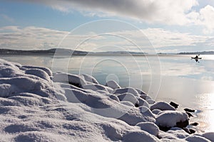 Snow on stones