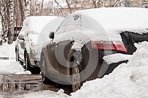 After snow storm car covered in snow