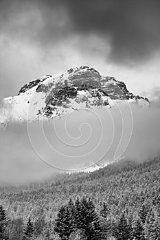 Snow storm over Paganella Mountain in Dolomites, Italy