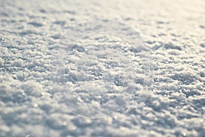 Snow surface close up. Fresh white snow texture.