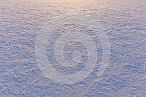 Snow surface texture in evening sunlight