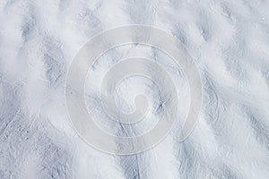 Snow texture on the ski slope, photo background
