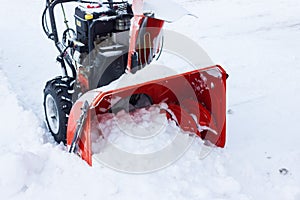 A snow thrower is the best assistant for snow removal in the winter.snow removal with snowplow.abnormal amount of snow