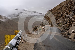 Snow on top of mountains at Khardung La Pass Highest road of The World photo