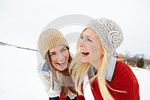 Snow, travel and girl friends laughing outdoor in winter on romantic vacation, adventure or holiday. Happy, smile and