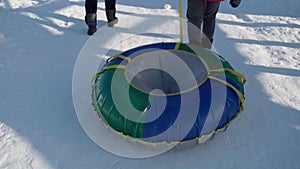 Snow tubing winter activity, runs in winter. Winter entertainment