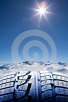 Snow tyre and landscape