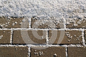 Snow on urban pavement