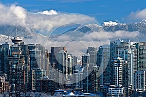 Snow in Vancouver. Vancouver downtown and mount Seymour view from Broadway.