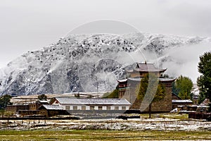 Snow view of tibetan village at Shangri-la China