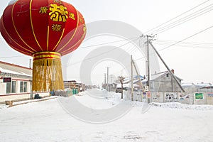 Snow village with red lantern