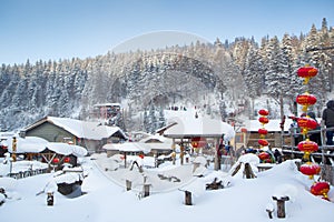 Snow village with red lantern