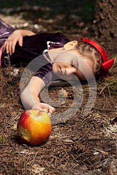 Snow white with apple, litle girl