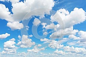 Snow-white clouds on a blue sky on a sunny summer day, template for designer