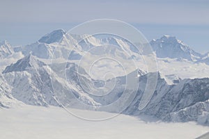 Snow white mountains with glaciers in the upper Himalayas region near Sagarmatha Mount Everest.