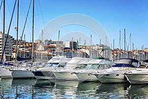 Snow-white sailing yachts in a marina in Marseille on a bright sunny day. Beautiful view