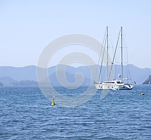 Snow-white yacht and blue distance