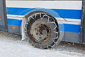 Snow winter chains on tyre of car