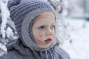 Snow winter close up portrait of cute toddler