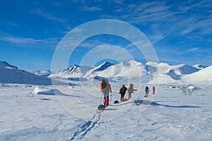 Snow winter skiing skitour expedition in the mountains of Sweden beyond polar circle photo