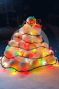 Snowballs heap with festive garland led lights