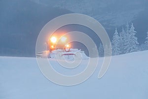 Snowblower. Snow removal vehicle in the mountain. Cleaning from snow. Winter. Wallpaper background. Natural scenery. Location