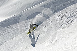 Snowboard freeride in high mountains